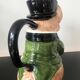 Ceramic jug representing a fox in hunting attire date 1986