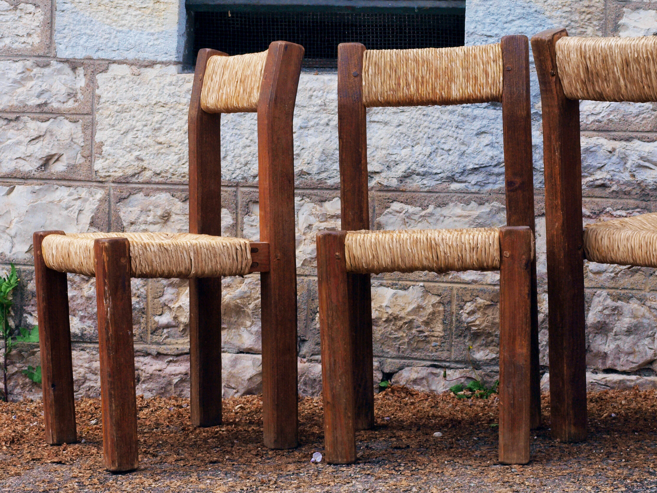 Brutalist chairs in pine and straw, France, 1950s, set of 4