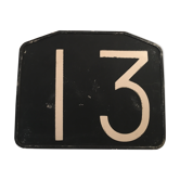 Old Bakelite No. 13 bus line plate.