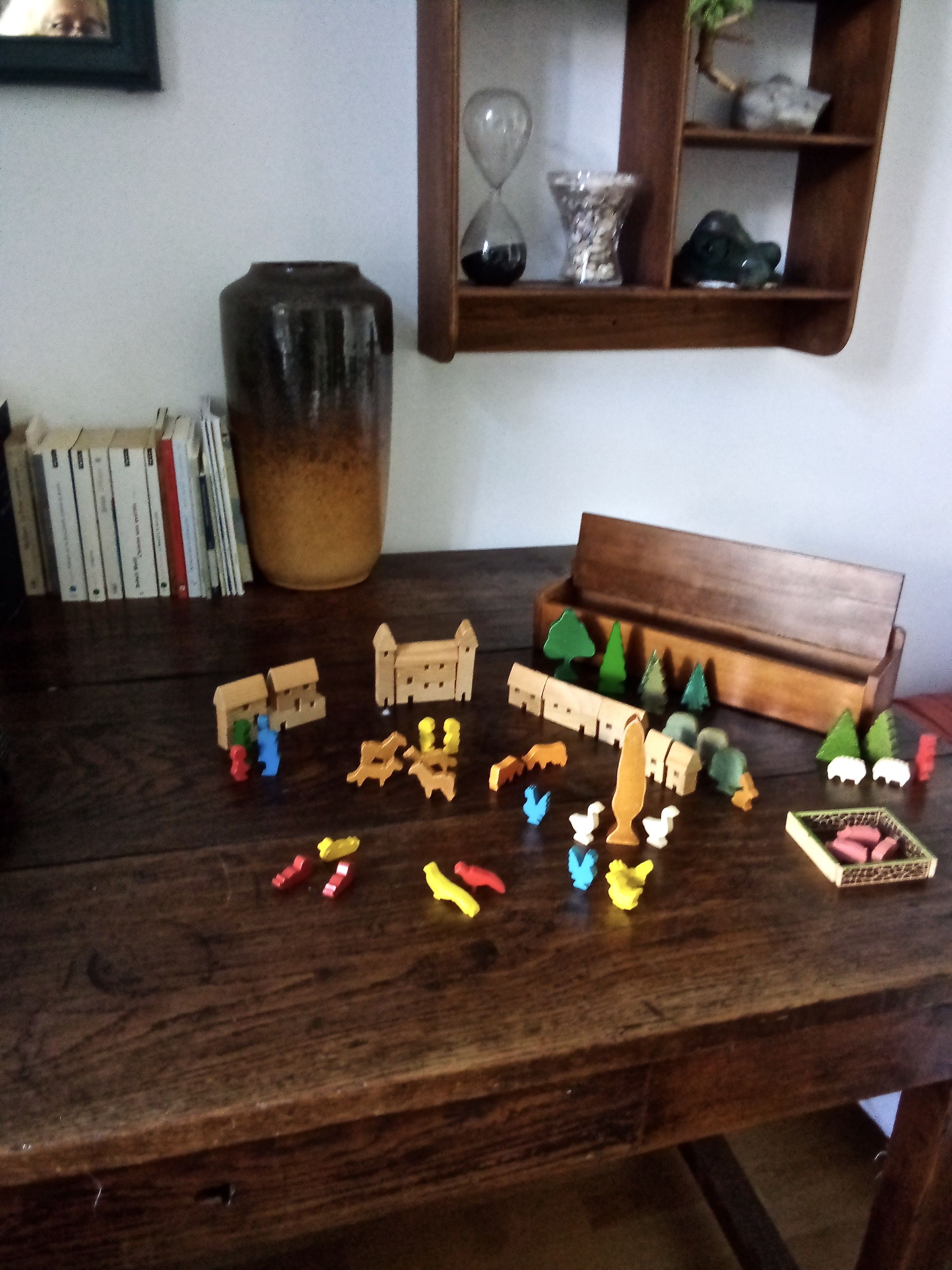 Village small farm wood painted with animals and characters stored in a large old box.