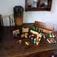 Village small farm wood painted with animals and characters stored in a large old box.