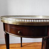 Mid 20th century hot water bottle table