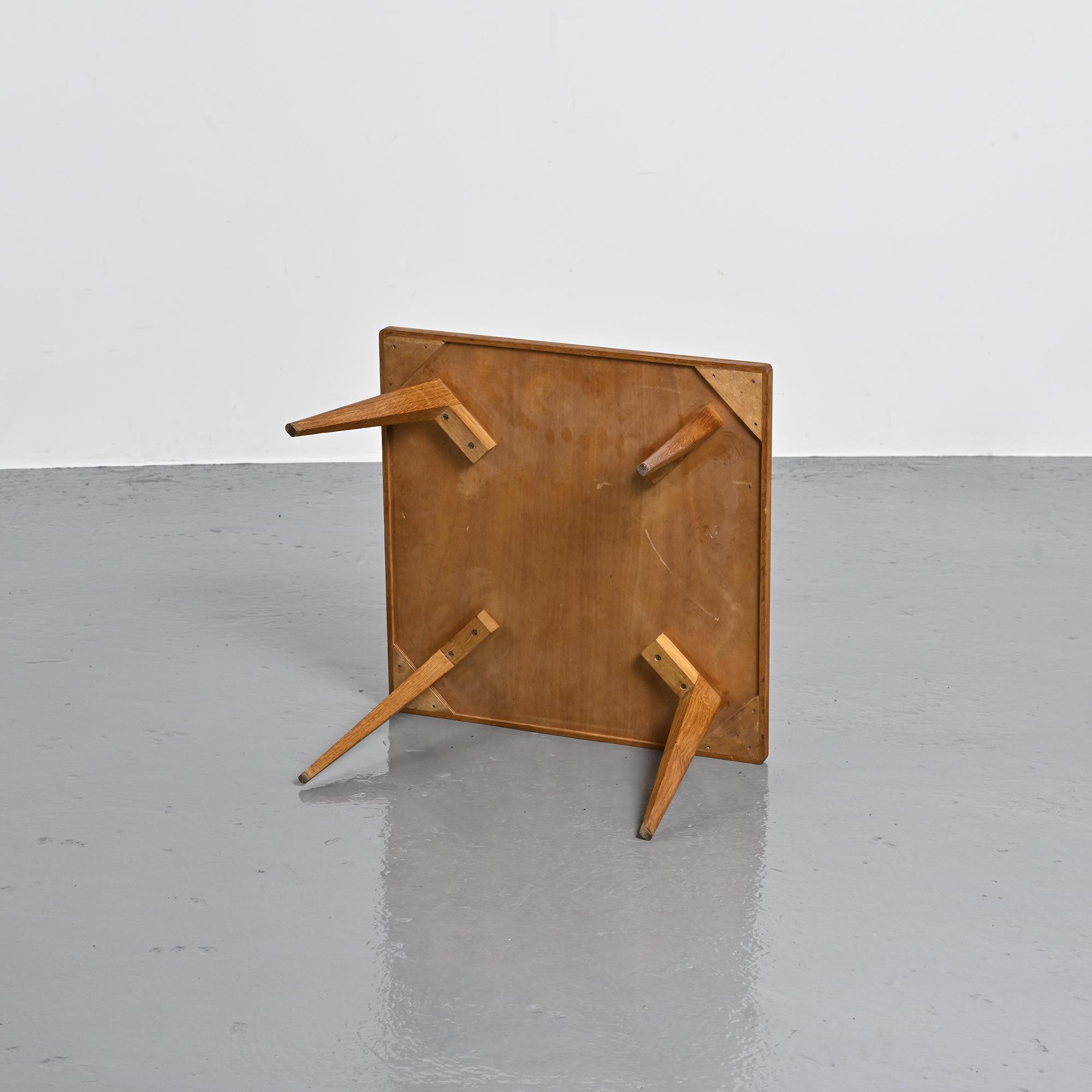 Coffee table with tapered legs, France, circa 1950-1960.
