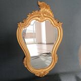 Miroir doré style louis xv.