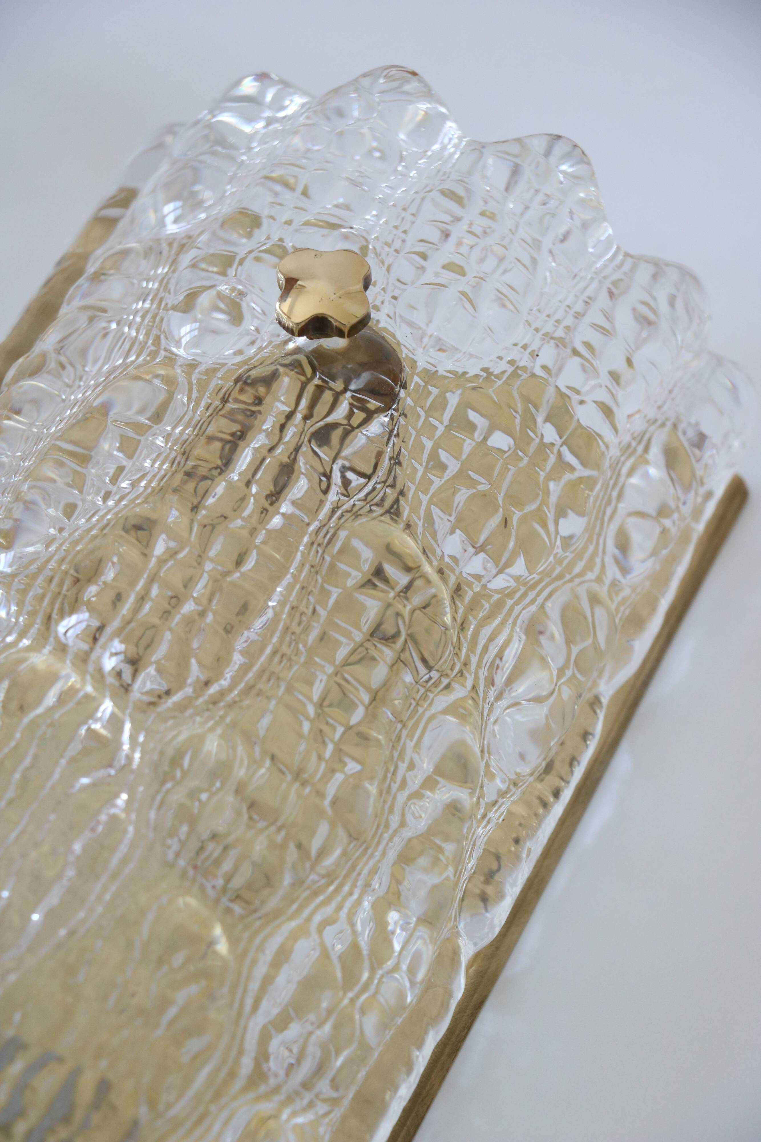 Pair of glass and brass wall lights by Carl Fagerlund for Orrefors.