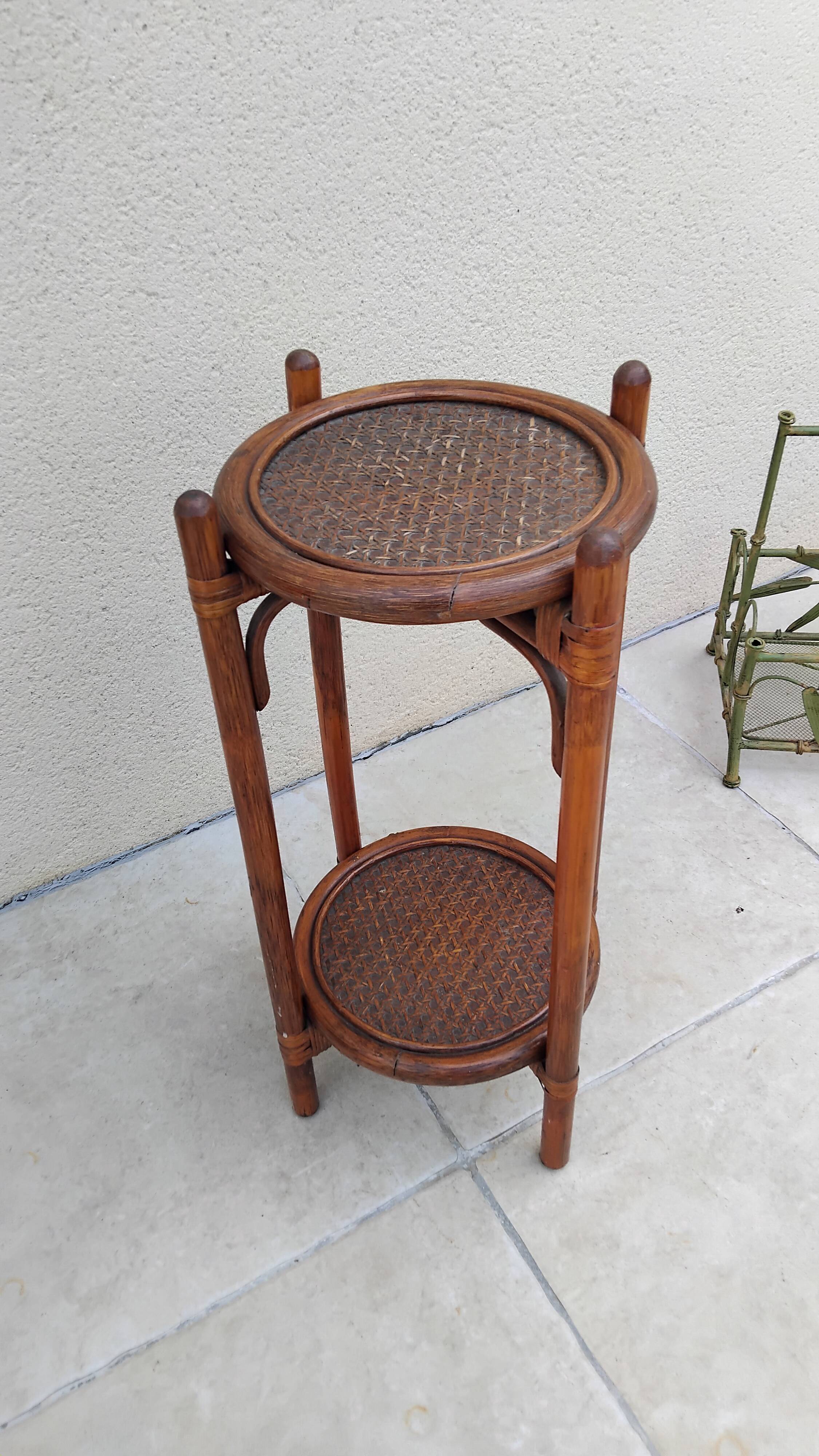 Vintage folding wooden and wicker side table.