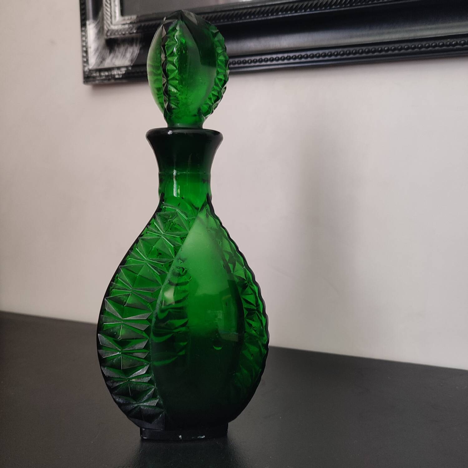 Vintage green carafe in chiseled glass