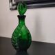 Vintage green carafe in chiseled glass