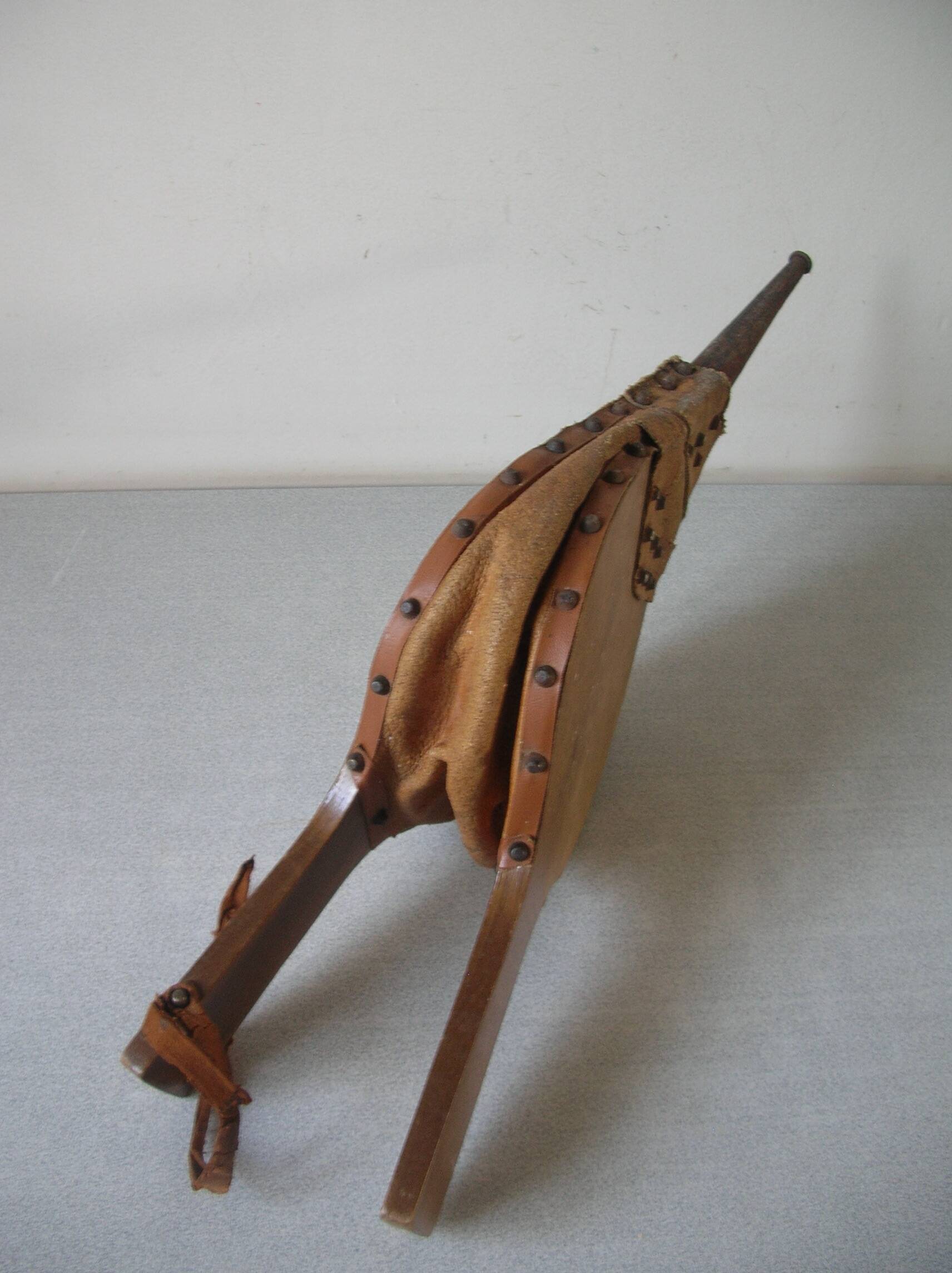 Old wooden and leather fireplace bellows works tool accessory