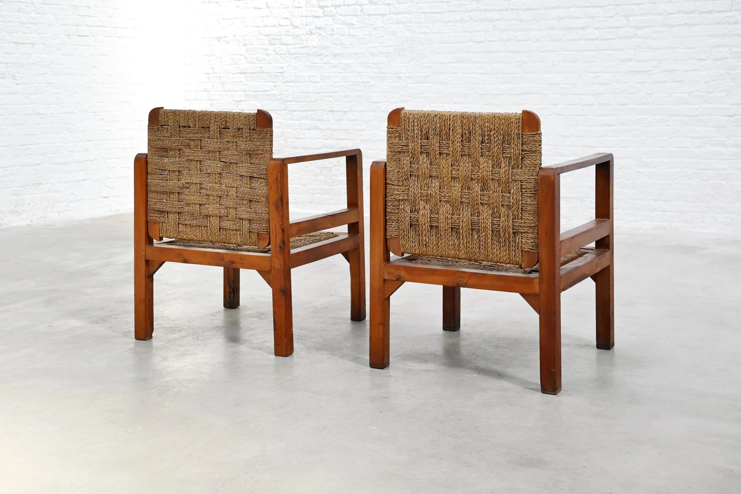 Paire de fauteuils en chêne français et en paille tissée, France, années 1960.