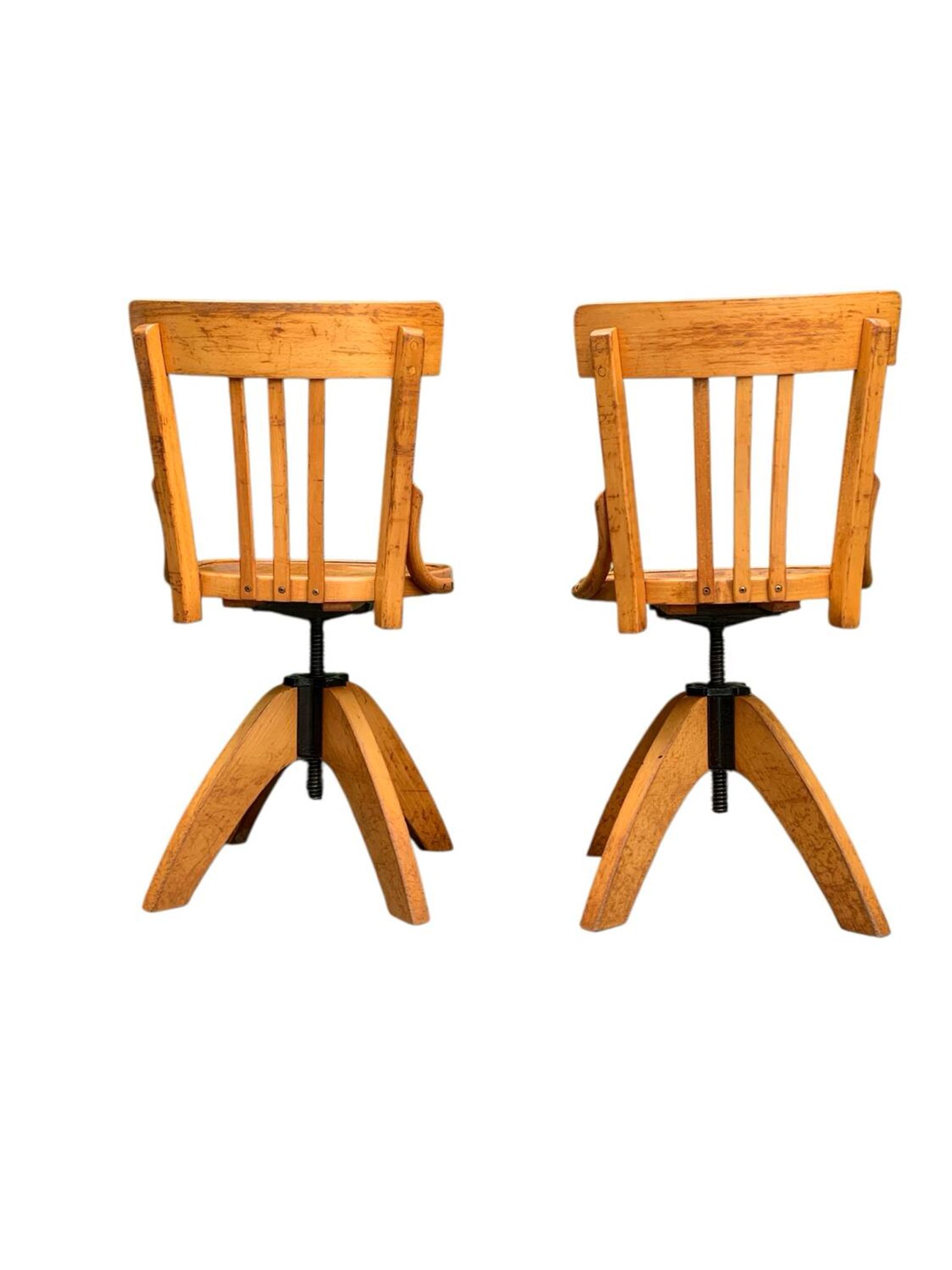 Pair of Baumann rotating screw chairs 1960