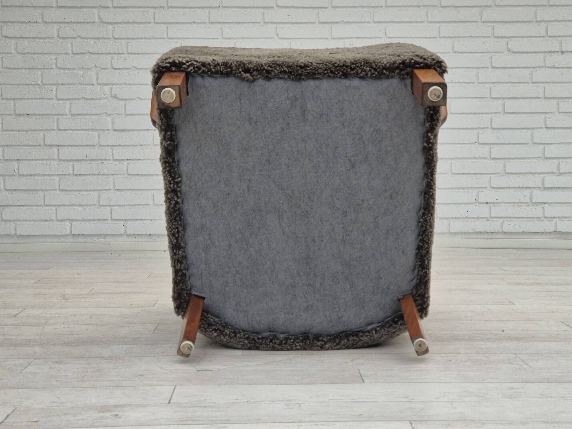 1960s, completely reupholstered Danish art deco armchair, genuine sheepskin "Wellington".