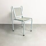 Pair of mid century perforated steel stacking chairs