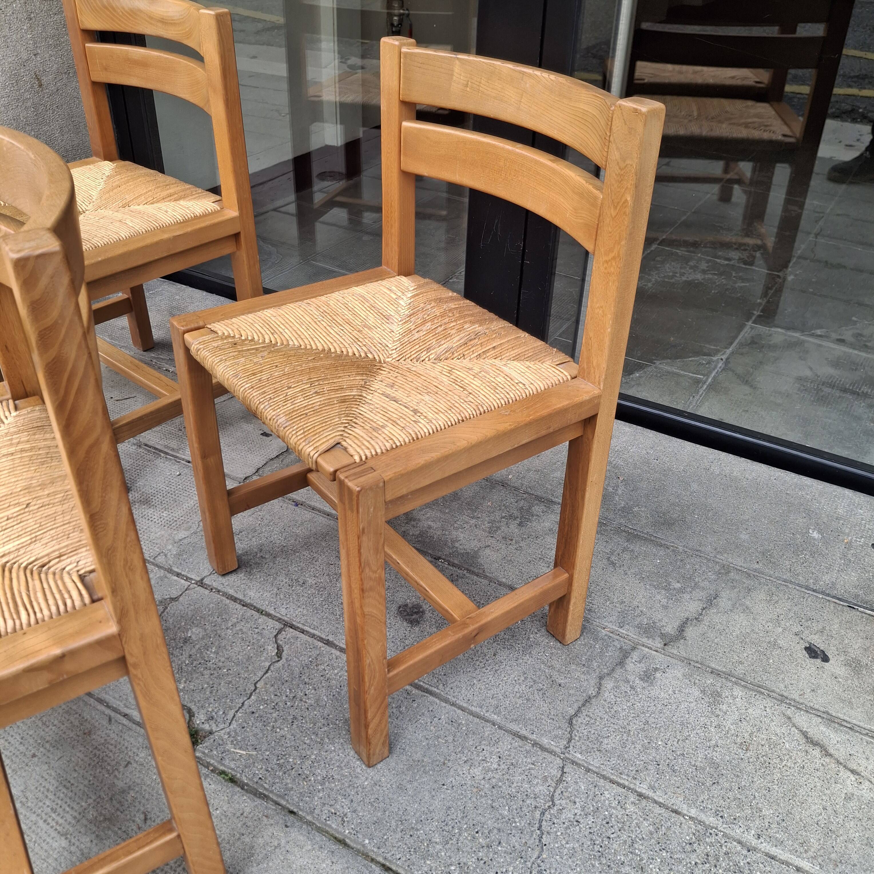 Set of four regaining chairs in elm. 1970