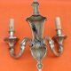 Large wall sconce in LXV style, patinated bronze.