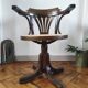 Vintage swivel office chair with curved wood and caning (Thonet style)