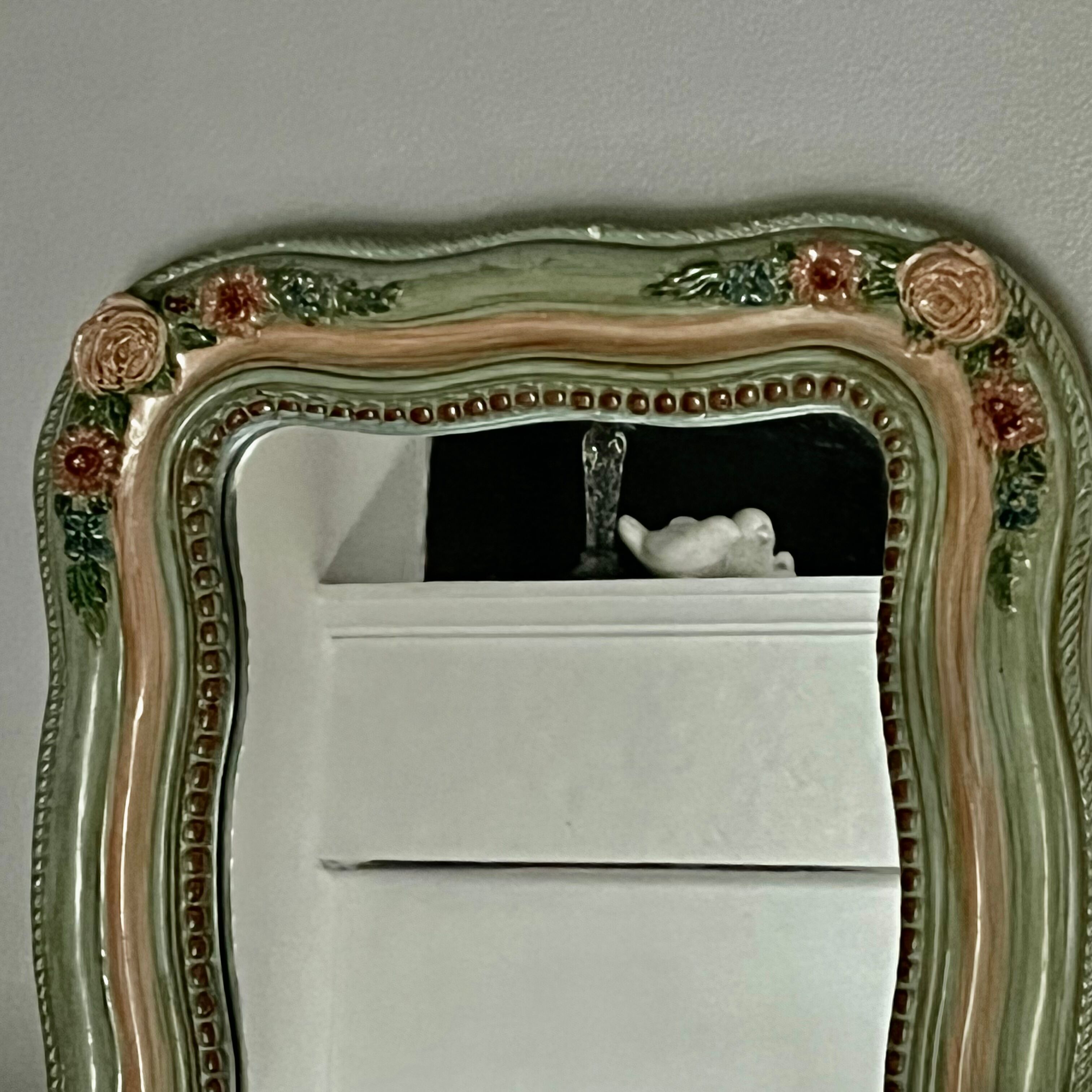 Antique mirror with roses