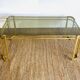 Gold metal and smoked glass coffee table – 1970s-624001
