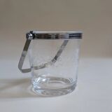 Clear glass ice bucket with an etched floral design