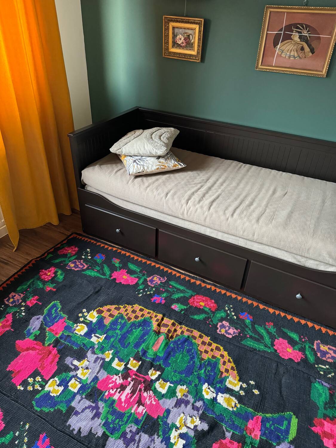 Romanian black wool carpet with a basket of colorful flowers