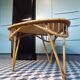 Tripod rattan coffee table, 79 cm per side