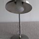 Articulated bedside lamp or wall light in aluminium, France circa 1960.