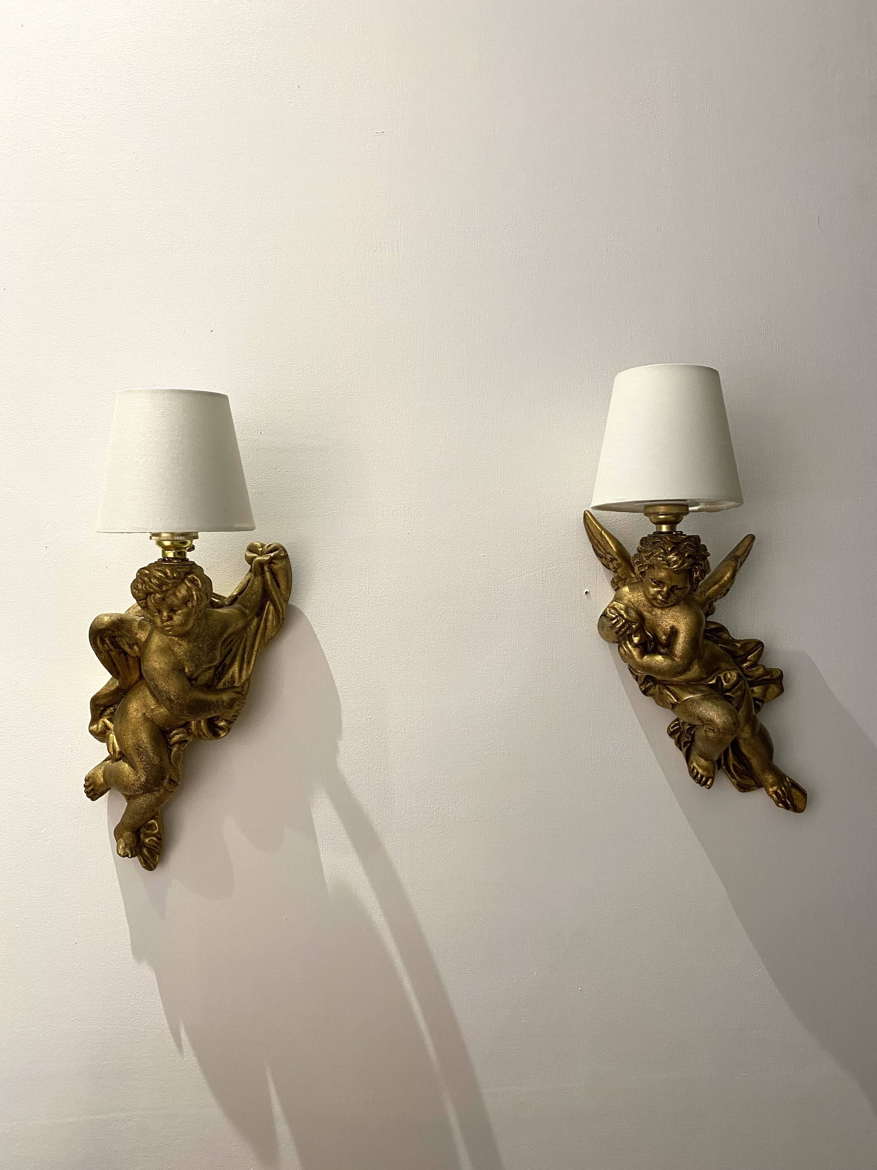 Pair of golden Puttis wall lights