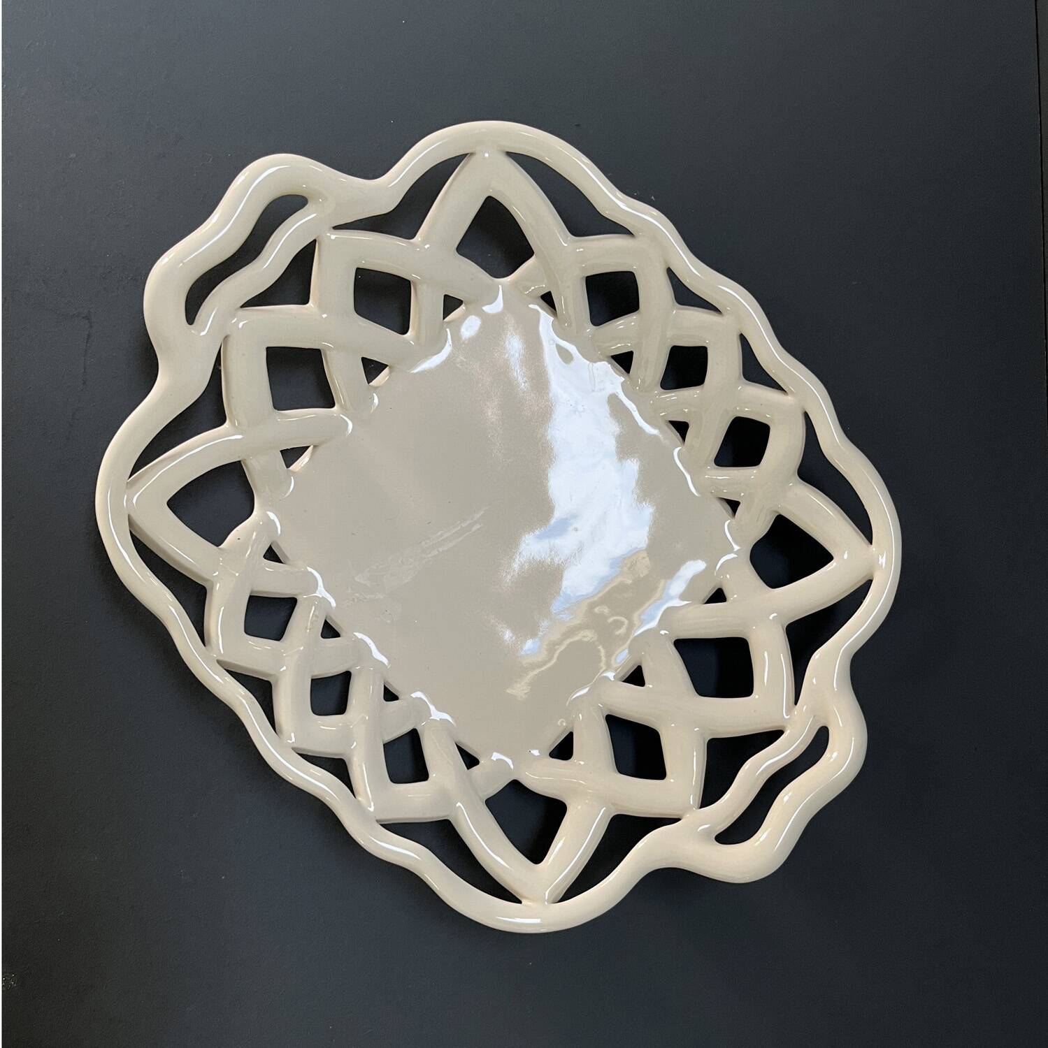 Woven ceramic basket