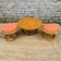 Coffee table with its pair of ottomans