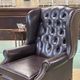 Chesterfield armchair with brown leather ears from the 1990s in very good condition