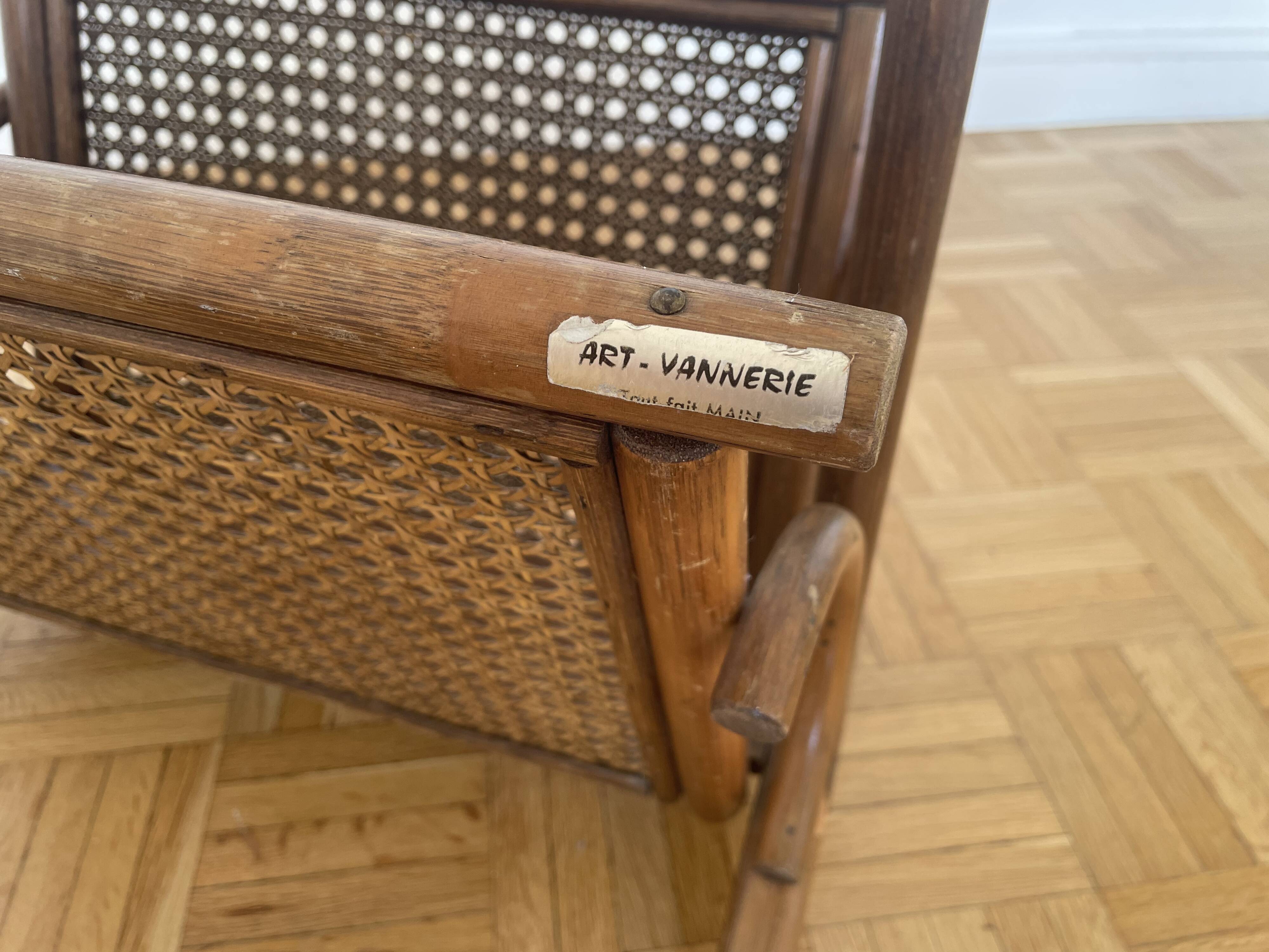 Brown rattan and cane magazine rack