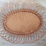 Oval mirror in natural wicker varnished 50x62cm