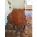 Old round table with flaps