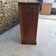 Oak workshop furniture with sliding doors.