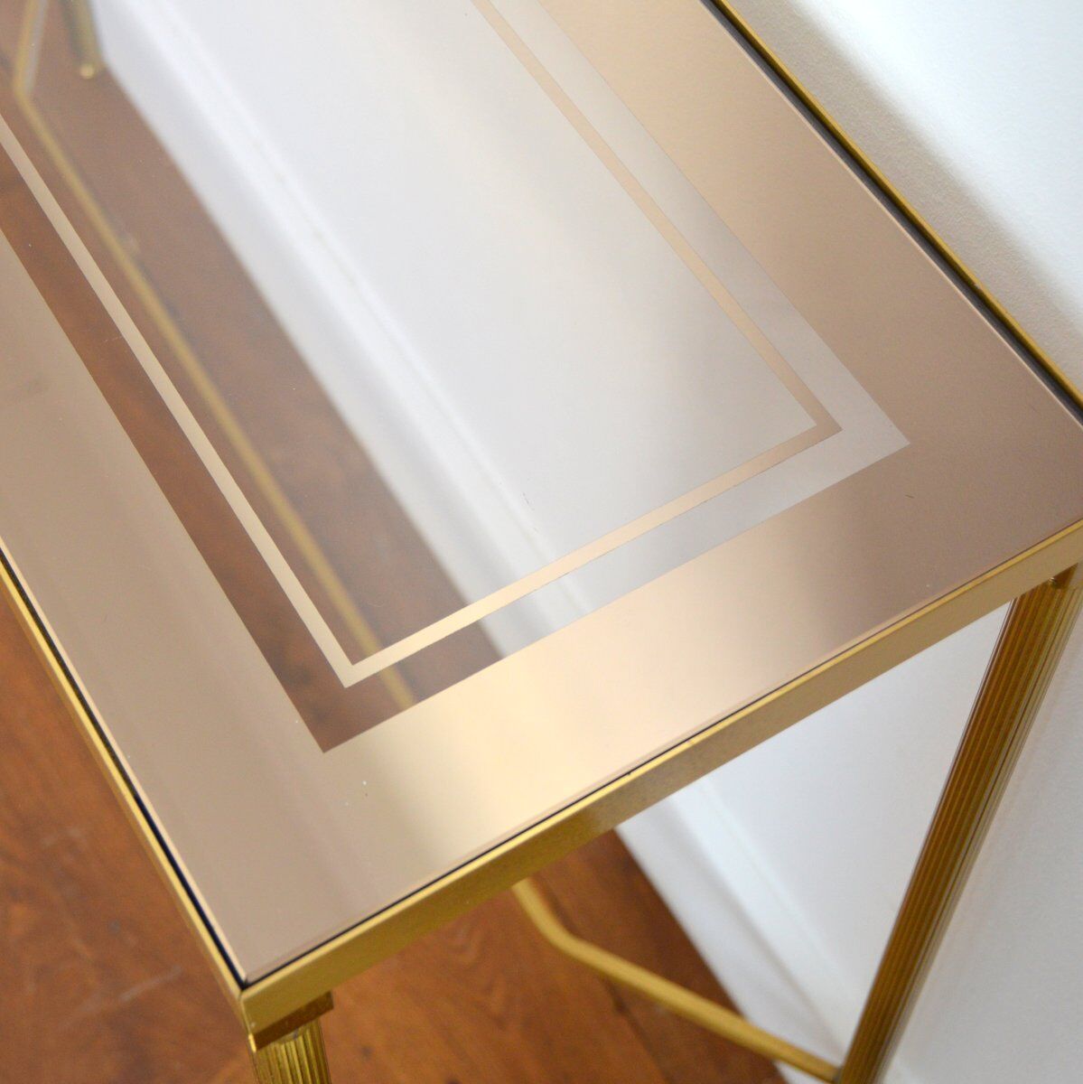 Gilded console and glass 1970s