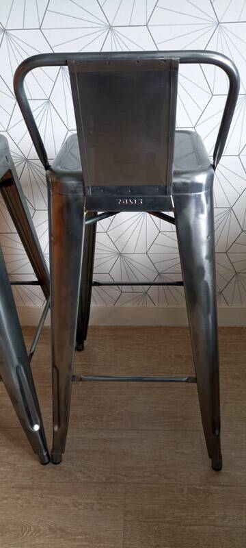 Pair of tolix hpd 75 stools – in varnished raw steel.