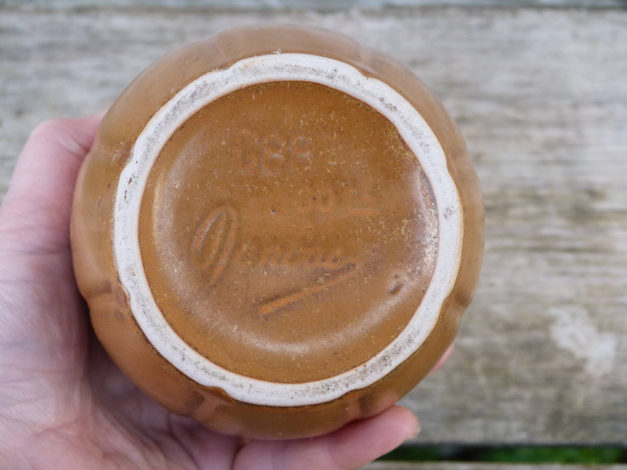 Vintage brown flamed stoneware jug signed Denbac.