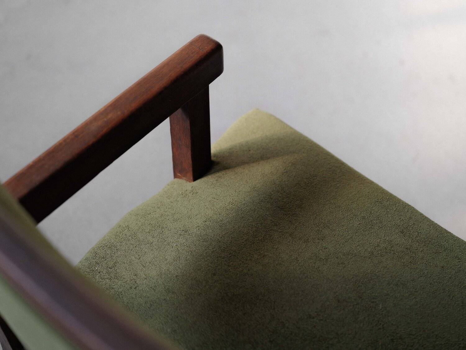 Pair of modernist armchairs in solid oak, France, circa 1940.