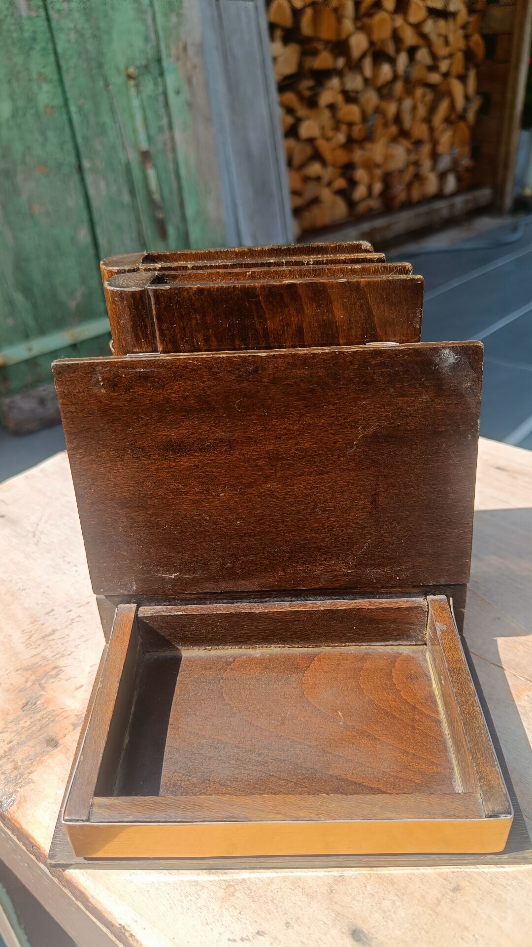 Wooden trompe-l'œil bookends with a book and box