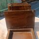 Wooden trompe-l'œil bookends with a book and box