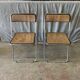 Pair of canned folding chairs