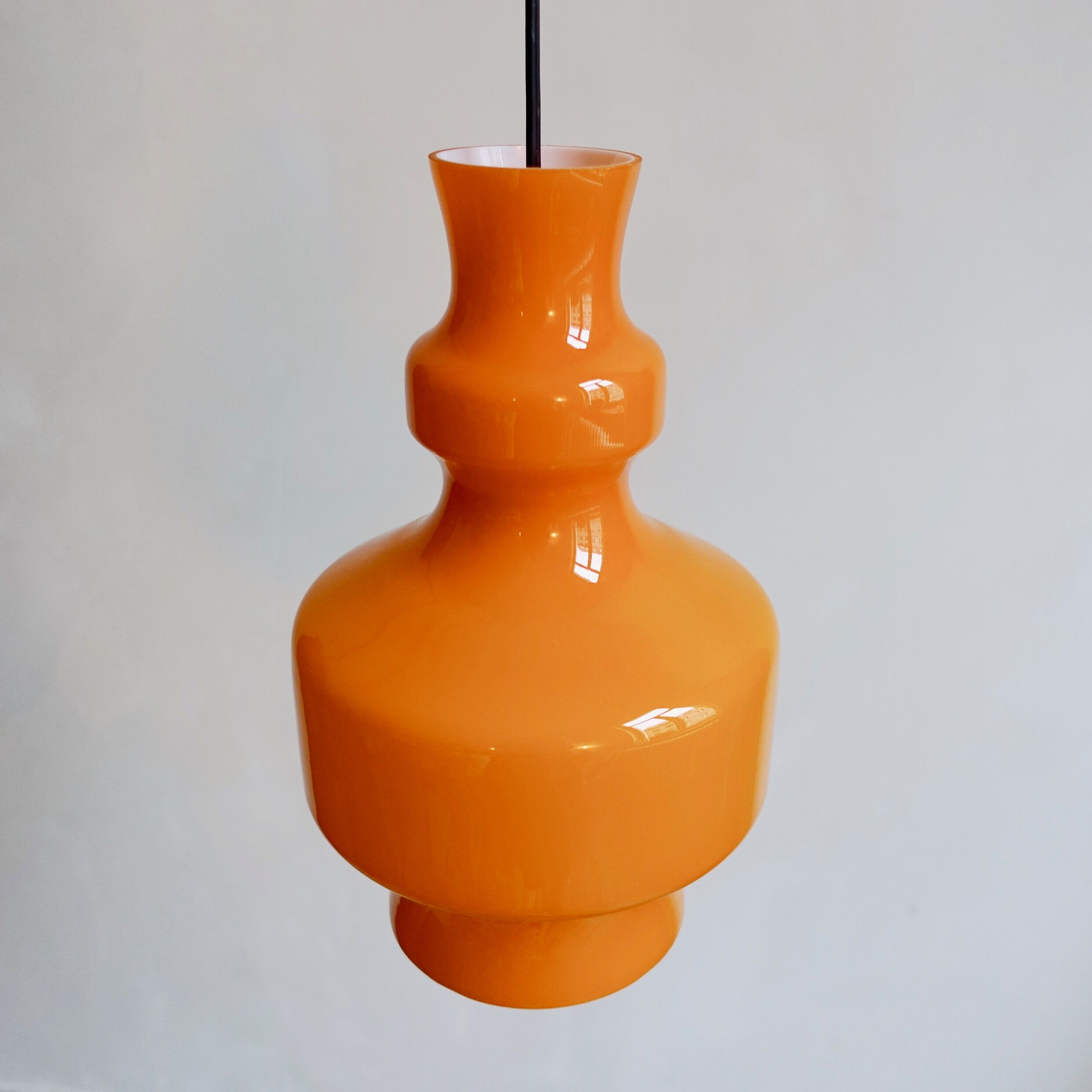 Opalin orange hanging lamp Raak Amsterdam
