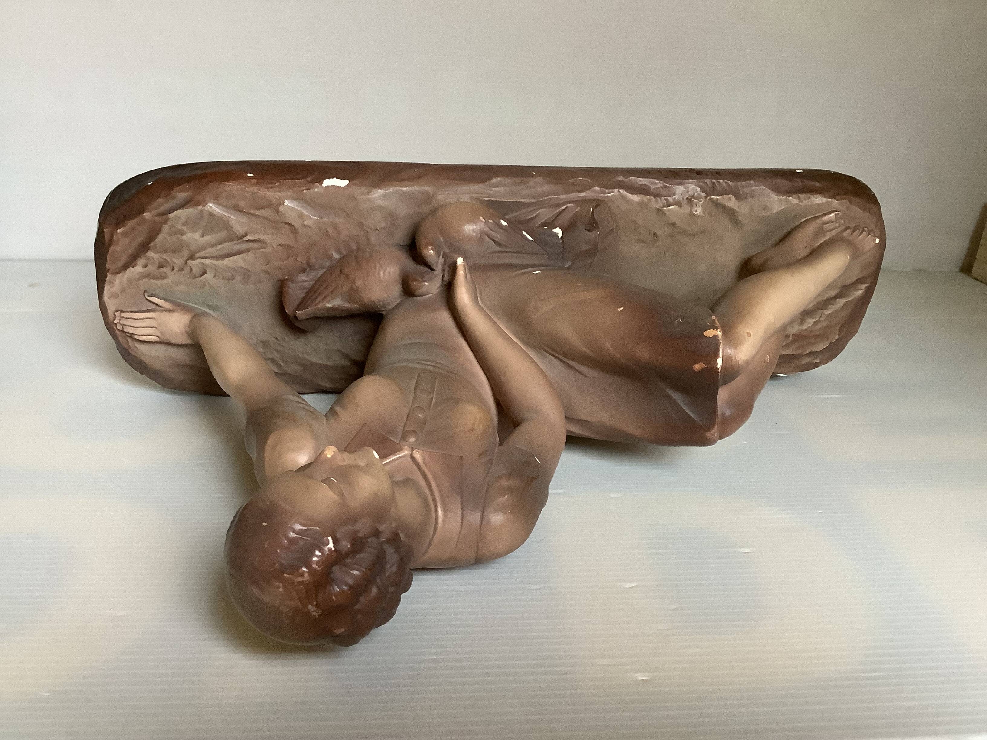 Art Deco statue of the woman with birds