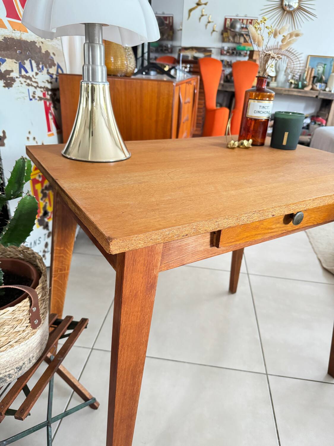 Old wooden desk or side table with compass legs