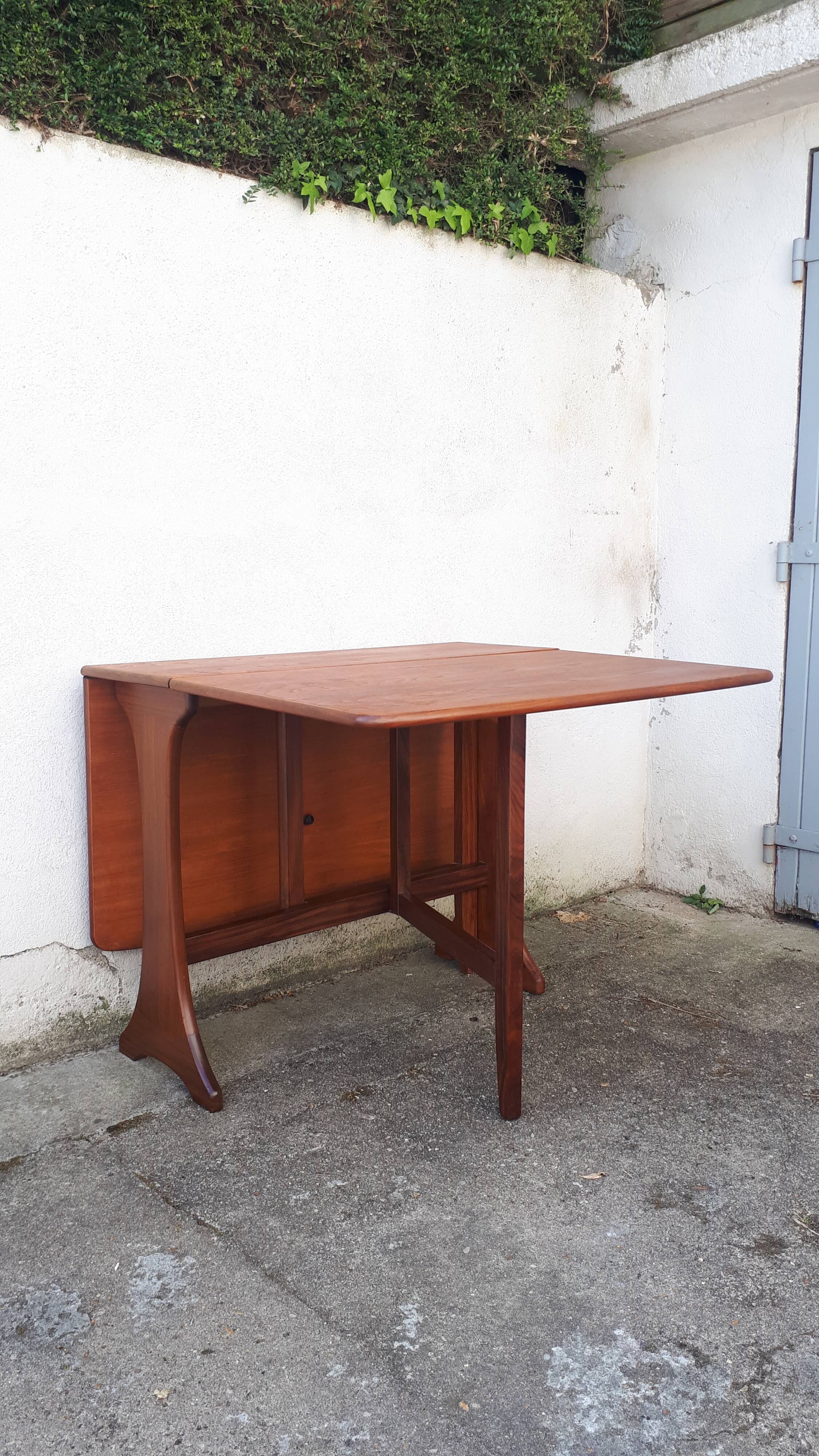 Vintage dining table console desk in teak and exotic wood from the 70s