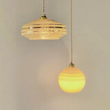 Pale yellow opaline ball suspension
