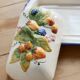 Large vintage faience butter dish with slip decoration – Fruit design