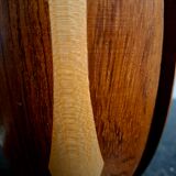 Bookends in exotic wood marquetry in the shape of a tambourine.