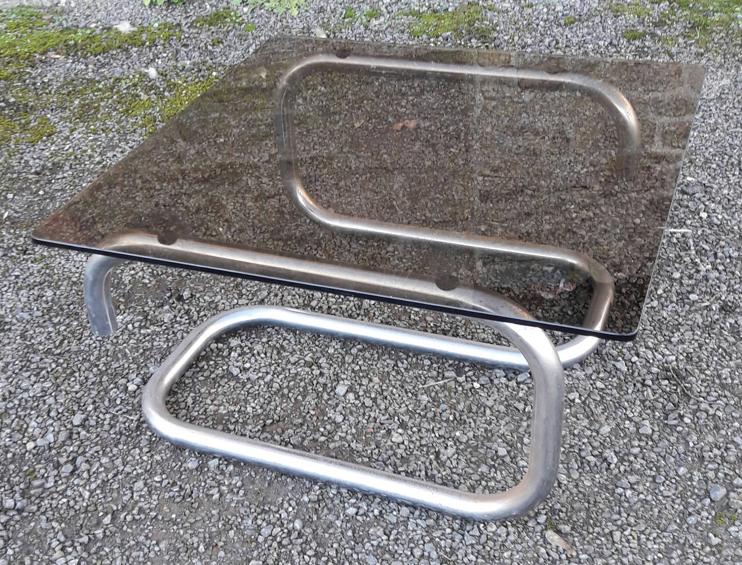 Coffee table in chrome metal and smoked glass 70's