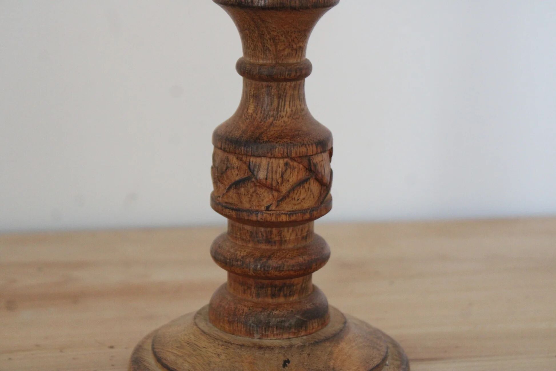 Turned and carved wooden candlestick with foliage decoration – H 20 cm